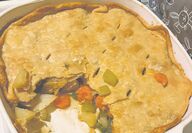 Picture of cooked chicken pot pie in casserole dish